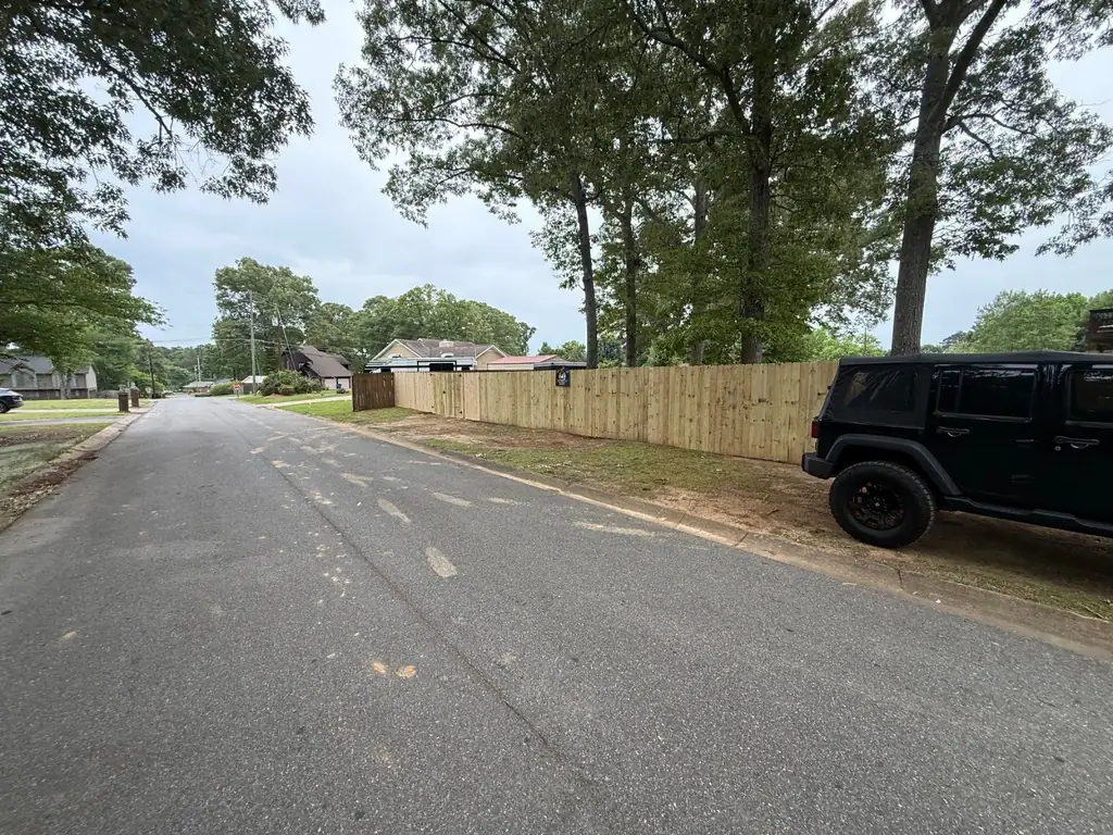 New wood privacy fence along the street