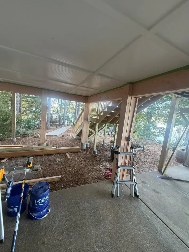Covered space under a raised deck being framed in