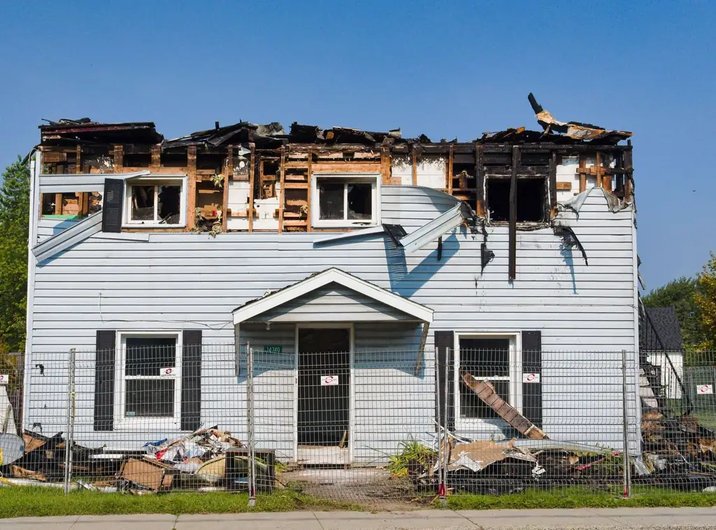 Two-story house with the upper floor burned out